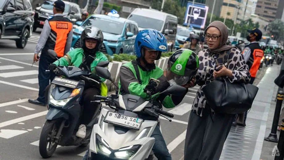 การเจรจาควบรวม Grab-GoTo ในอินโดนีเซีย: ปัจจัยด้านการเงิน การเมือง และสังคม