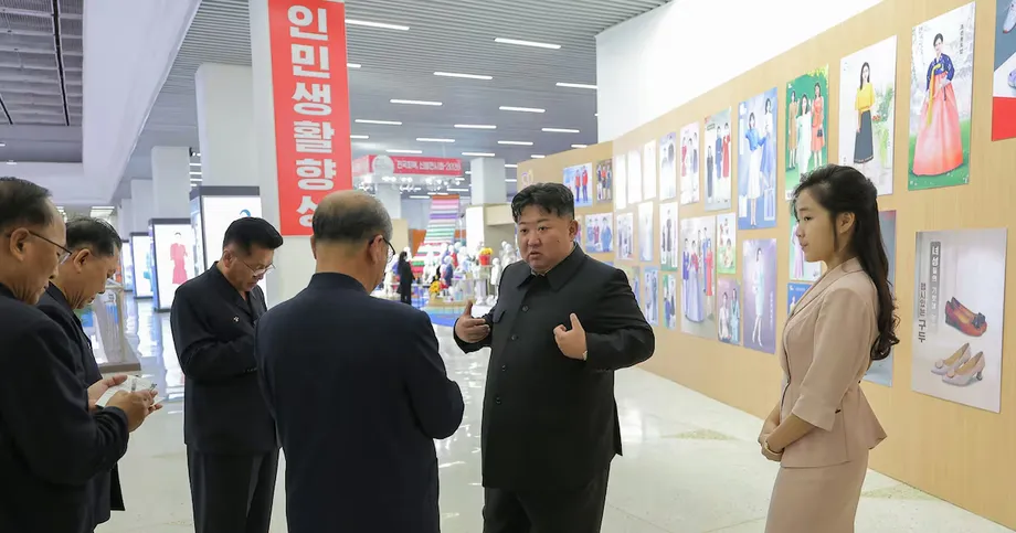 Kim Jong Un Visits Clothing and Shoe Exhibition With Family as Death Rumors Spread